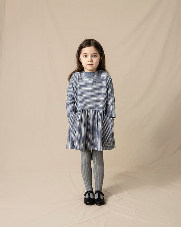 Pocket dress in navy stripes. Made from organic cotton, Icelandic design.