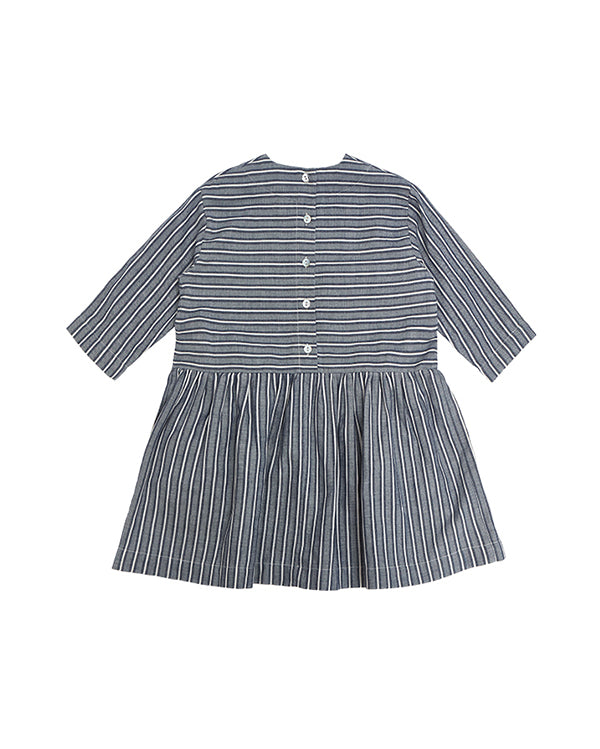 Pocket dress in navy stripes, back side. Made from organic cotton, Icelandic design.