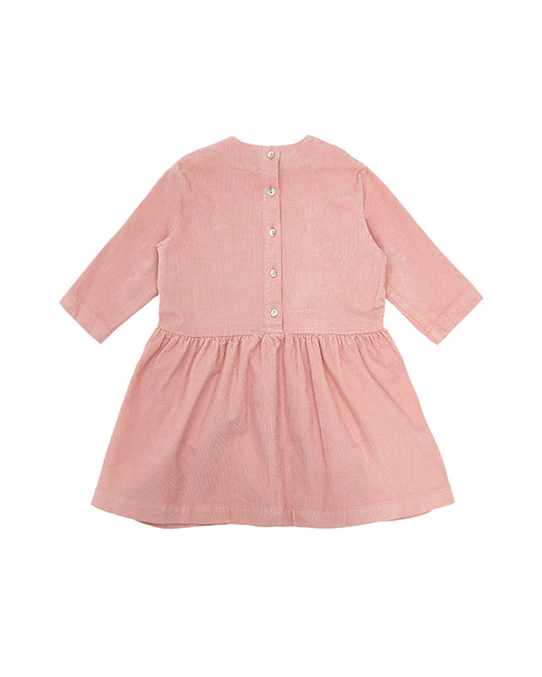 Pocket dress in pink, back side. Made from organic cotton. Icelandic design.